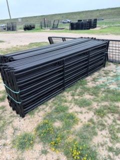 Stack of black livestock panels